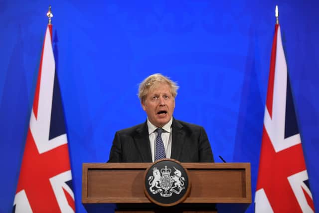 Britain's Prime Minister Boris Johnson holds a news conference (Photo by Toby Melville - WPA Pool / Getty Images)