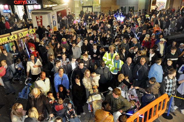 Huge crowds await the Christmas lights switch-on and fireworks in Commercial Road, Portsmouth in 2008.
Festive switch-on of the City Centre Christmas Lights in Commercial Road, outside Debenhams near the Jubilee Fountain and inside the Cascades Shopping Centre. 
Picture: Michael Scaddan (084638-0102)