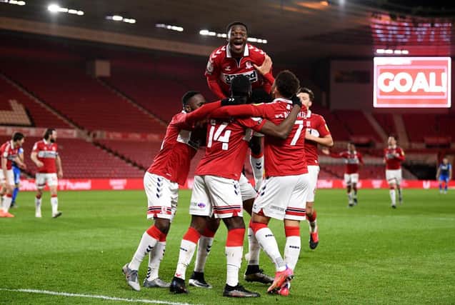 Marcus Tavernier of Middlesbrough celebrates with Marc Bola and team mates after scoring their side's second goal against Preston.