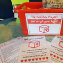 Red boxes containing sanitary products and other items are placed in schools and other venues to tackle period poverty in Wigan