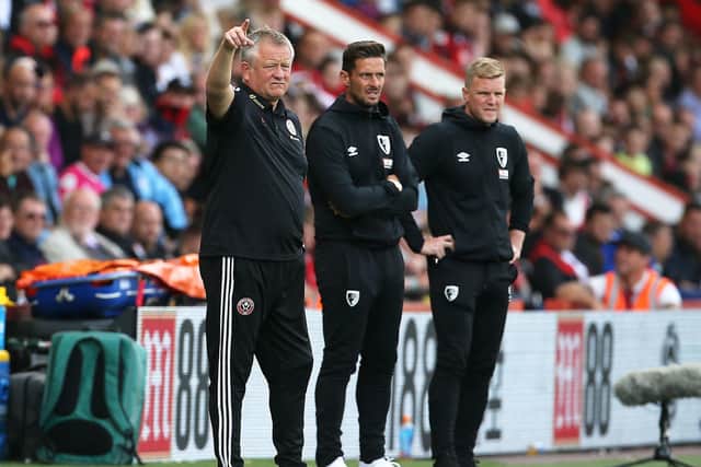 Sheffield United manager Chris Wilder (left), then AFC Bournemouth assistant manager Jason Tindall, and his predecessor Eddie Howe (right): Mark Kerton/PA Wire