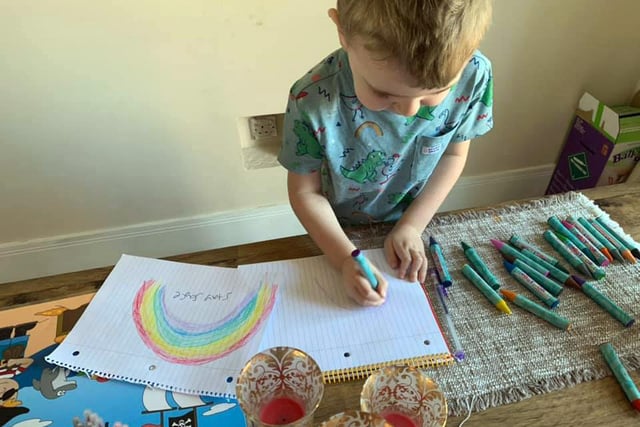 Mansfield rainbow pictures. 
My little boy, Henry making rainbows for our house and our neighbours. Picture sent in by Heather Moody.