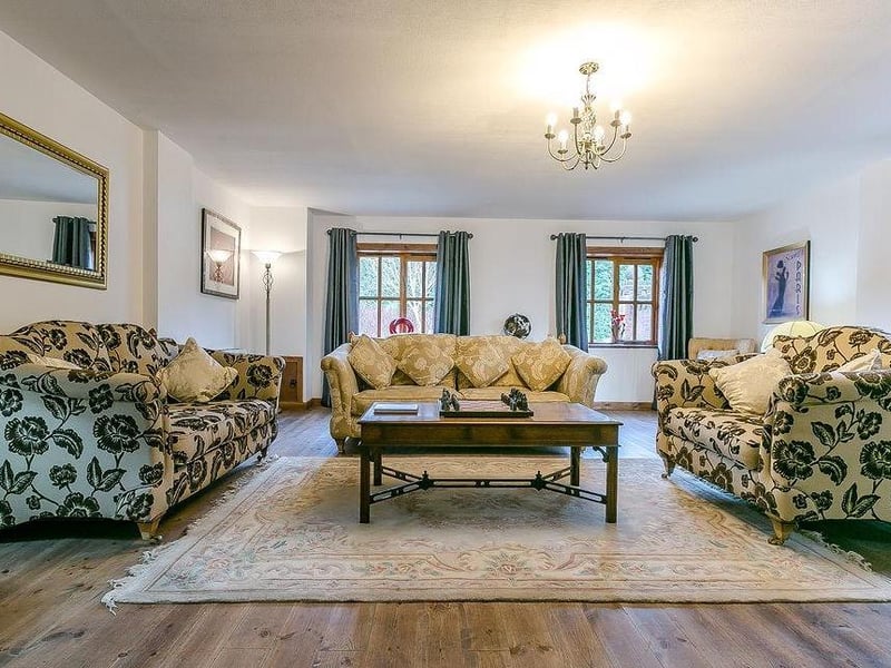 Moving on to Woodmans Cottage, the chic, two-bedroom chalet that is separate to Loxley Lodge. Converted from high-quality offices, it boasts a delightful living space.