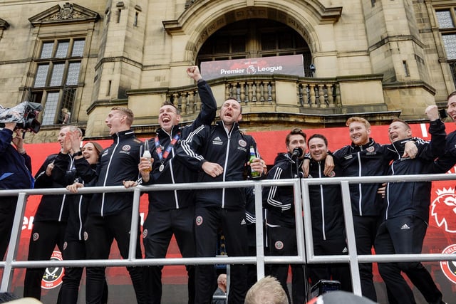 Sheffield United coaching staff celebrate their promotion to the Premier League at Sheffield Town Hall, May 7, 2019