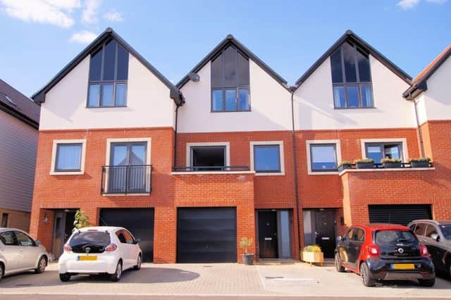 Three-bedroom town house with views towards Portsmouth Harbour. Includes a fitted kitchen/diner with balcony and harbour views, a ground-floor shower room, utility room and landscaped rear garden. Marketed by Fenwicks. Find out more at: https://bit.ly/39uudk4:
