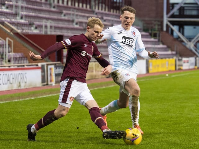 Gary Mackay-Steven and Regan Hendry in action.
