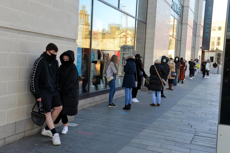 Waiting outside Primark before its opening.