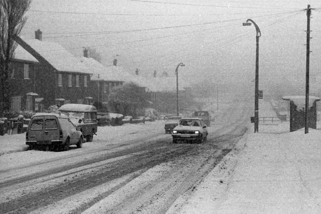 A grey sky and blizzards for these drivers in Pennywell to cope with in 1991.