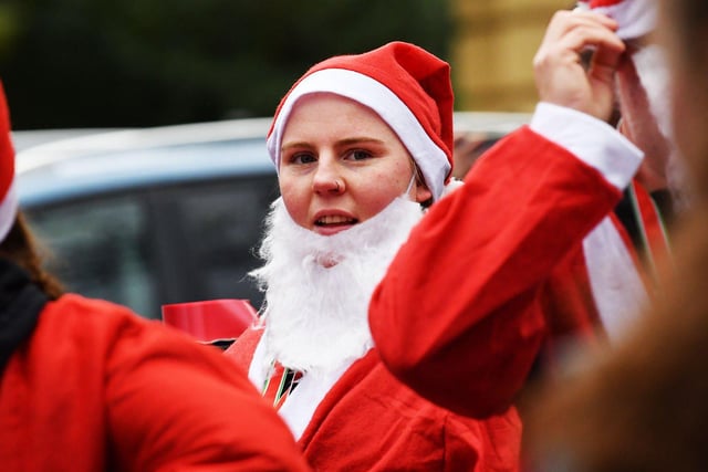 A runner after she finished the annual Santa Run.