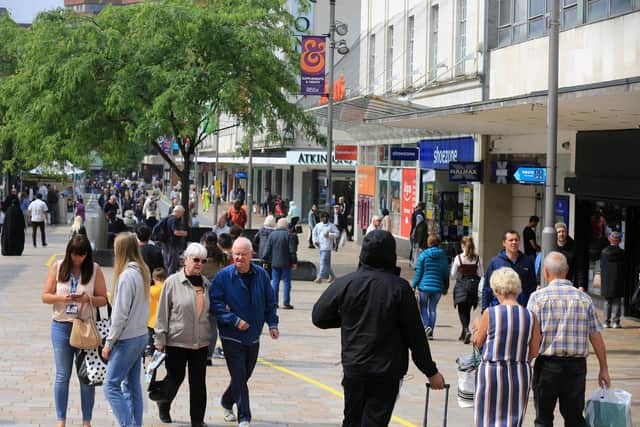 Shops in Sheffield City Centre start to reopen on Monday June 15th. Shoppers onThe Moor. Picture: Chris Etchells