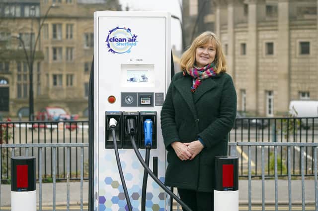 Cllr Julie Grocutt with one of the new electric car charging points in Carver Lane car park in Sheffield city centre.Picture Scott Merrylees