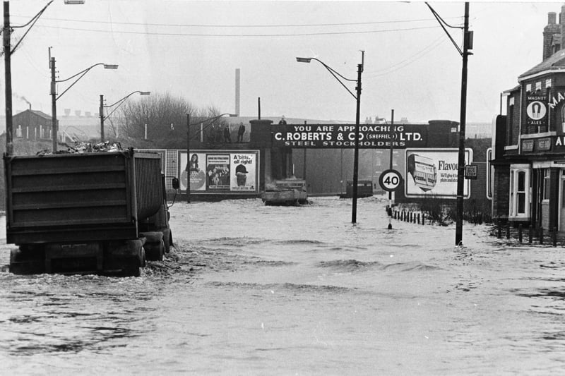 The flooded main Sheffield to Rotherham Road... April 13, 1970