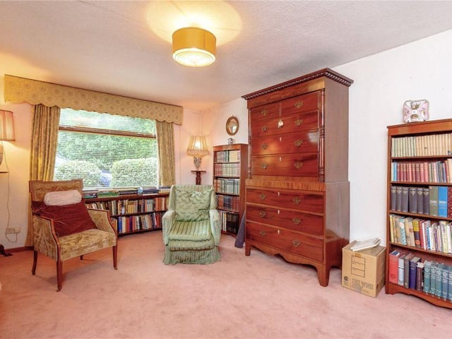 The library and music room offers another generously sized living space on the ground floor