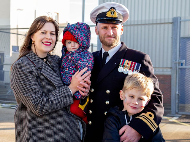 Samantha and Jonathan Lovell, Georgina 10 months and Cameron, seven, near HMS Diamond. Picture: Habibur Rahman