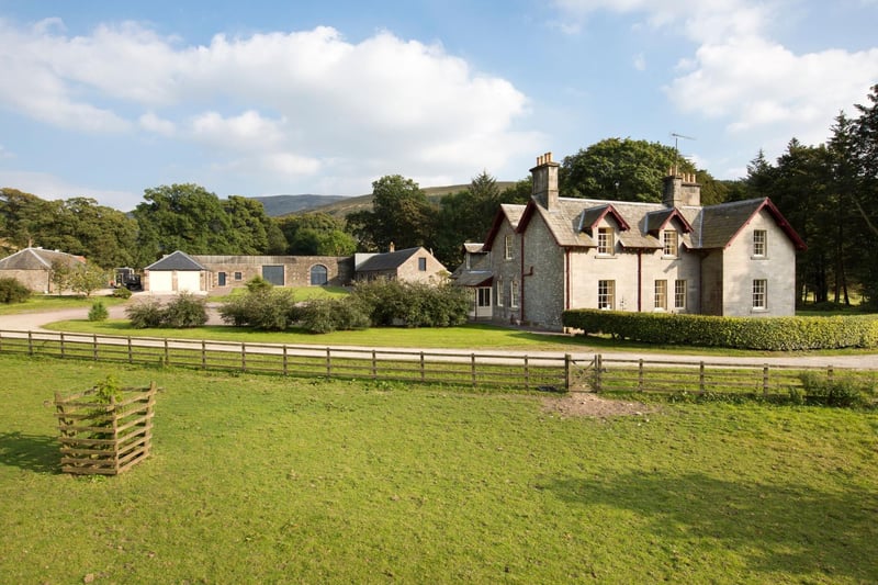 Travel down a tree-lined drive, across the Ewes Water, and past sweeping farmland to arrive at this 1860 farmhouse, designed by renowned Scottish architect William Burn.
