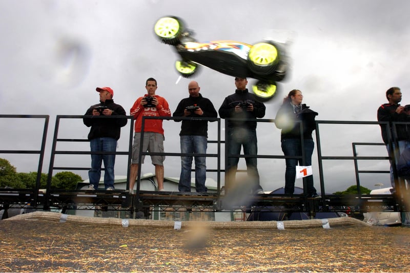 Jumping through the rain drops. A Radio Controlled Car Club meeting at Bents Park in 2010 but were you there?