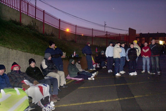 United fans queue for tickets for the Worthington Cup semi-final, second leg tie against Liverpool at Anfield in January 2003.