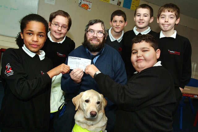 Pupils from the Year 7 nurture group at Valley School handed over a £50 cheque to John Dixon who is secretary of the Chesterfield branch of the Guide Dogs for the Blind in 2006