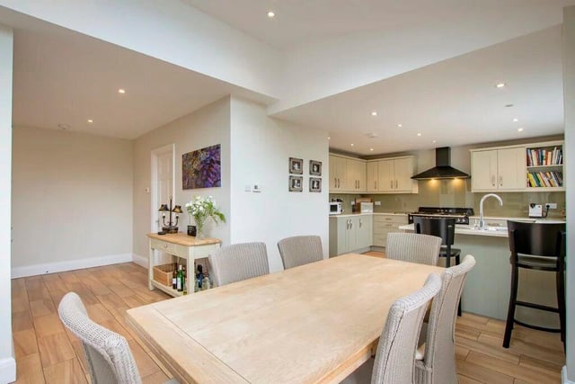 "The stunning, open plan kitchen occupies the majority of the full-width rear extension and certainly provides the wow factor to this splendid family home," the estate agents say.