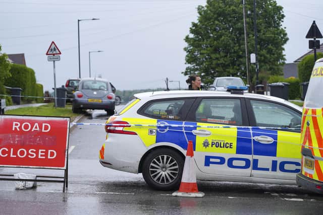 Wilcox Road was closed at the junction of Fox Hill Road in Sheffield following a stabbing. Picture Scott Merrylees