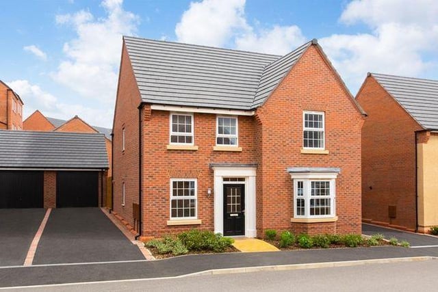 This four bedroom house has an open-plan dining kitchen with family area and 'glazed pod' with French doors to garden. Marketed by David Wilson Homes, 01623 355820.