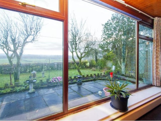 Staying in the dining area, this is the amazing view of rural Derbyshire from the large window in the garden room at the rear. Lean back in your rocking chair and behold!
