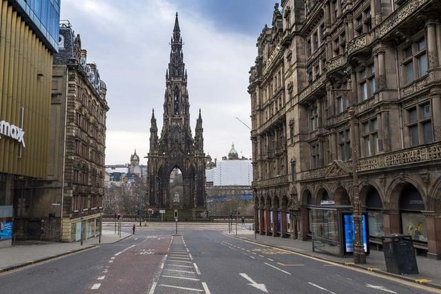 Eerie streets in March as lockdown was just announced- such as this one in Edinburgh around the Scott Monument at the east end of Princes Street- filled us with a shocking sense of isolation.