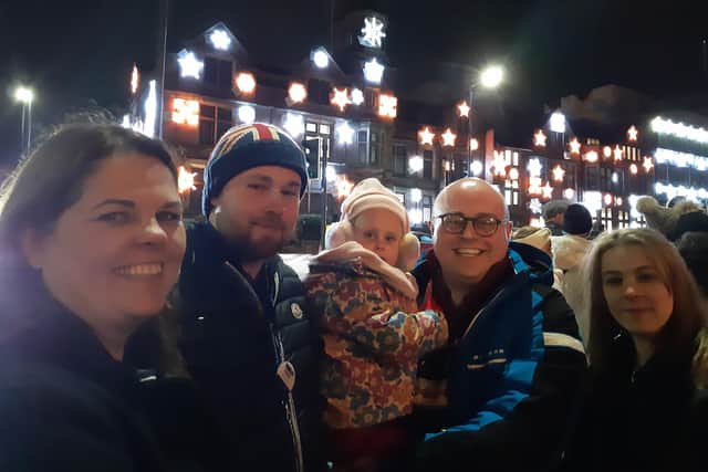 Margo Taylor, centre, switched on the Sheffield Children’s Hospital Christmas lights to cheers and applause from delighted supporters. She is pictured with her dad, Jack, and along with One Stop community adviser Toyah Glennan, Woodhouse shop manager Adam Greaves, and Kiveton Park shop manager Nicole Gibbons.