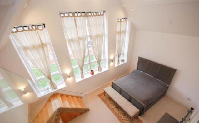 The master suite has its own Mezzanine lounge, en-suite shower room and walk in wardrobe