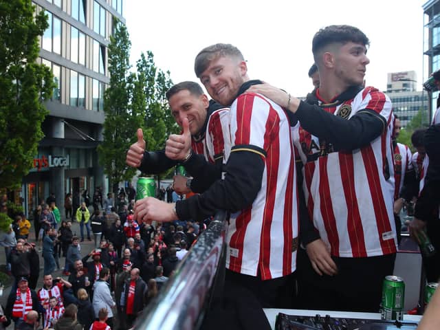Tommy Doyle (centre) and James McAtee (right) during Sheffield United's promotion parade: Paul Thomas /Sportimage