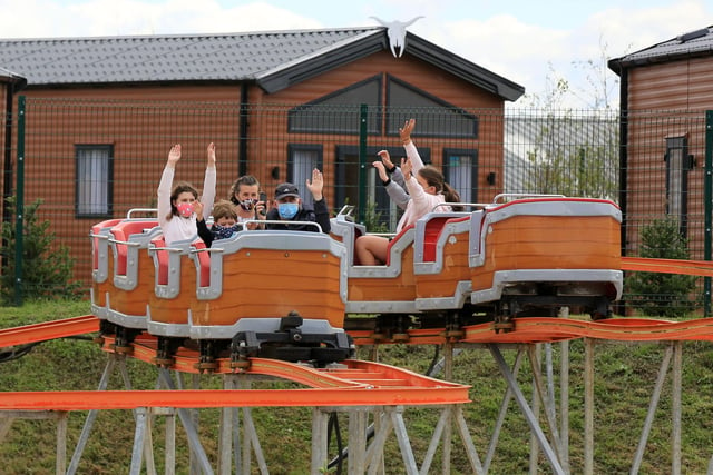 Enjoy a great day out at South Yorkshire's theme park, Gulliver's Valley. The £37 million venue beside Rother Valley Country Park has plenty of rides for the whole family to enjoy. Visit: https://www.gulliversvalleyresort.co.uk/ for more information. 
Pictured is people enjoying Gulliver's Valley on its opening day of Saturday July 11, 2020. Rocky Ridge Railway. Picture: Chris Etchells