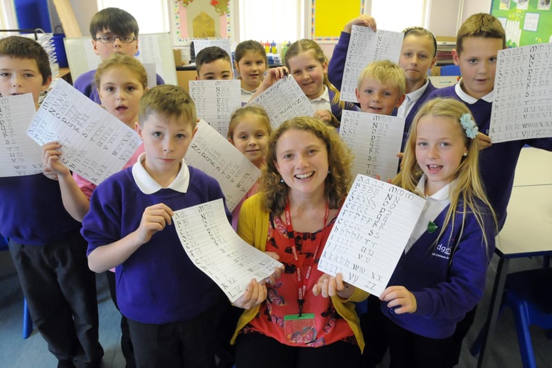 Angela Reed and these Ridgeway Primary School pupils were focusing on calligraphy in this 2014 view. Is there someone you know in the photo?