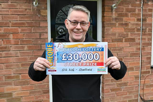 People's Postcode Lottery winner Andrew Lucas, one of four neighbours in Sheffield's S12 postcode district to share £150,000, plans to spend some of his winnings on a family holiday to Ibiza (pic: Darren Casey / PPL)