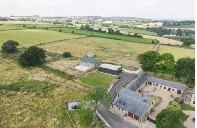 Set in 20 acres of land, Northedge Farm Barns in a hamlet near Tupton is surrounded by countryside views.