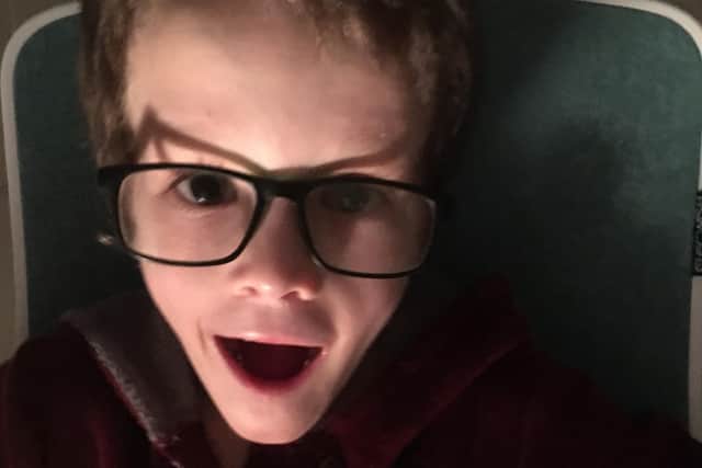 An amazed Jesse Wiffen when he found out he had raised £1,000 for charity