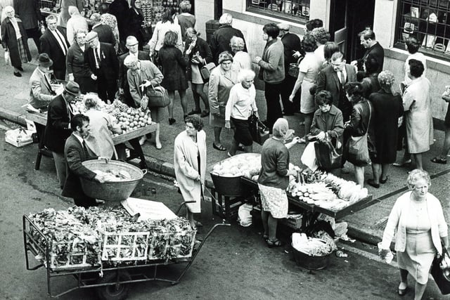 Market traders in Dixon Lane, Sheffield on September 15, 1970, which was a regular stop for fruit and veg