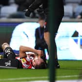 Rhys Norrington Davies of Sheffield United goes down in some pain early in the game against Coventry City: Darren Staples / Sportimage