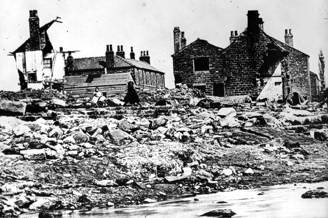 Undated handout photo issued by Sheffield City Council of the of ruins at Malin Bridge, Sheffield, including the remains of Cleakum Inn (left) , following the Great Sheffield Flood in 1884