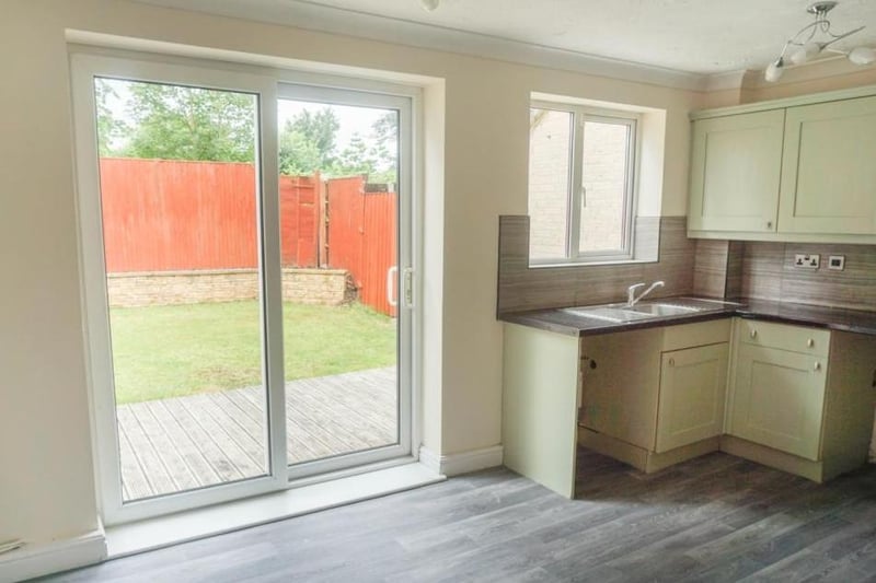 Kitchen/dining area with patio doors leading to the rear garden