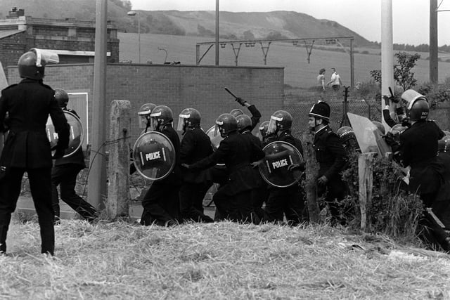 Pickets and police face to face at Orgreave as the riot police go in