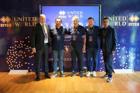 Representatives from Errea and United World, including Sheffield United chief executive Steve Bettis (second right) gather at the company's HQ near Parma