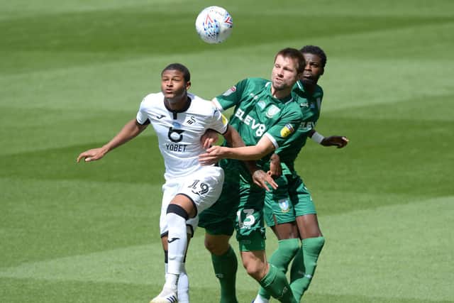 Owls Julian Borner beats Citys Rhian Brewster.. Pic Steve Ellis