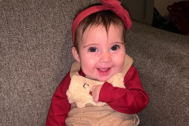 A big smile from Emilee Rose - we think she's ready for Santa!