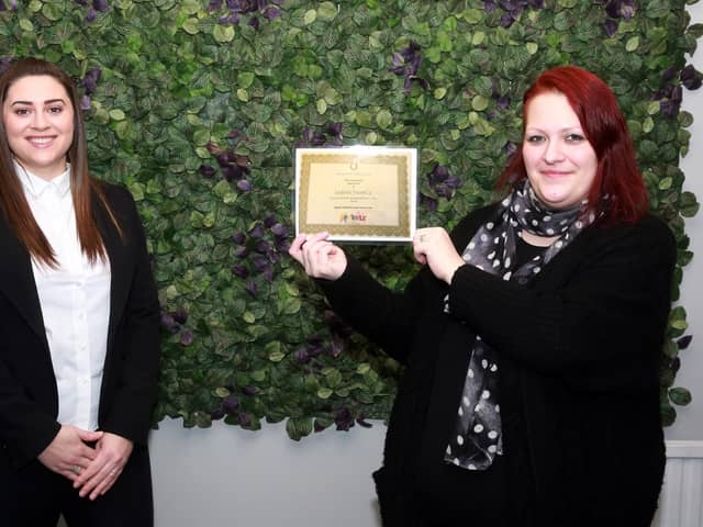 Sabina France with her certificate with Katie Biurch from Graysons Solicitors. Photo by Glenn Ashley