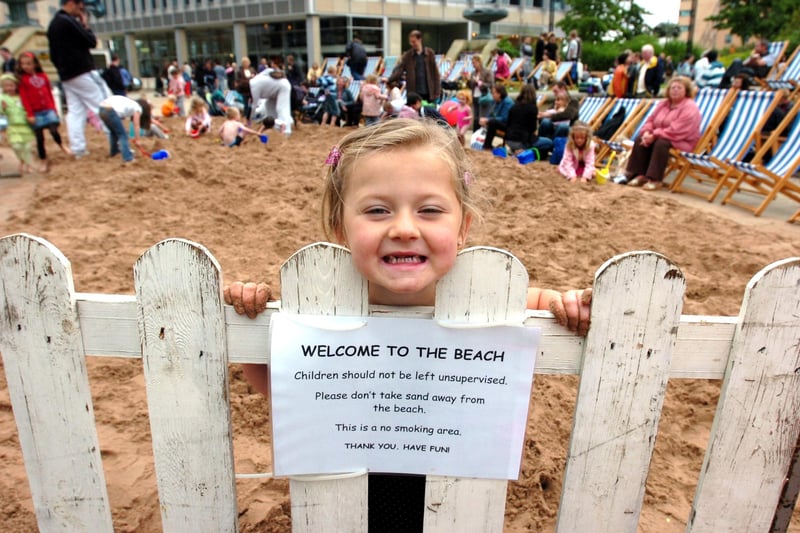 All smiles for three-year-old Summer Dunraven from Beighton on a beach in the Peace Gardens