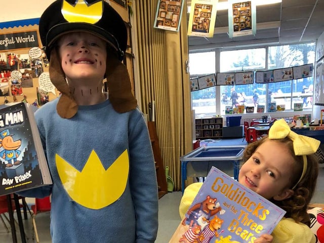 Mary frank, 4, and Max Frank, 8, dressed as Goldilocks and Dog Man at Horndean Infants School for World Book Day.