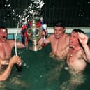 Whetu Taewa, Paul Broadbent, Mark Aston and Paul Carr celebrate the Challenge Cup victory in the famous Wembley bath. Photo: Paul Chappells