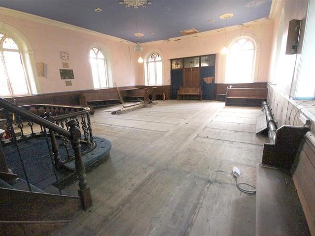 Some of the original seating is still visible inside the chapel.