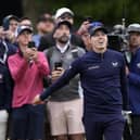 Matthew Fitzpatrick, of England, reacts to his shot on the 18th hole during the third round of the U.S. Open golf tournament at The Country Club in Brookline, Mass. (AP Photo/Charlie Riedel)