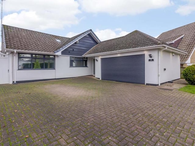As we say farewell to the impressive Parkland Close property, here is a good view of the front. As well as a lawned garden, with shrubs and trees, there is an extensive, block-paved driveway, which provides off-street parking and leads to an integral double garage with an electric roller door.